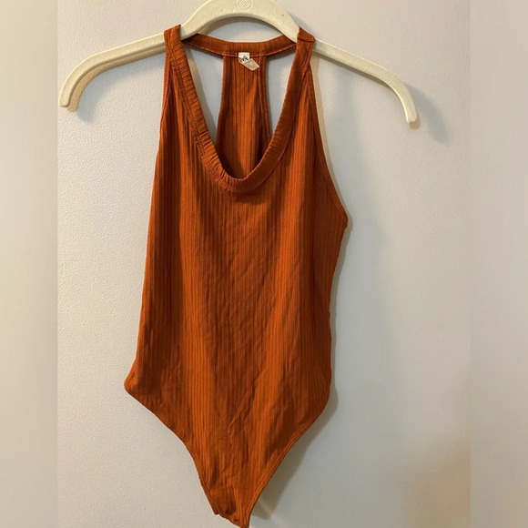 Free People speed dial body suit in rust / orange. NWOT. Size XS. - Picture 4 of 8